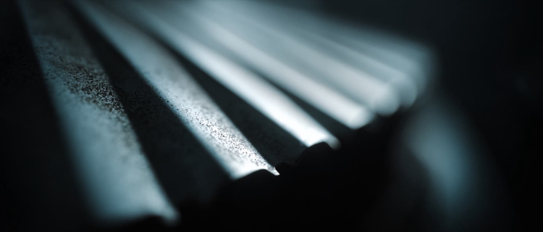 Cinematic macro frame of a precisely machined metal surface from the DUST Identity proposal